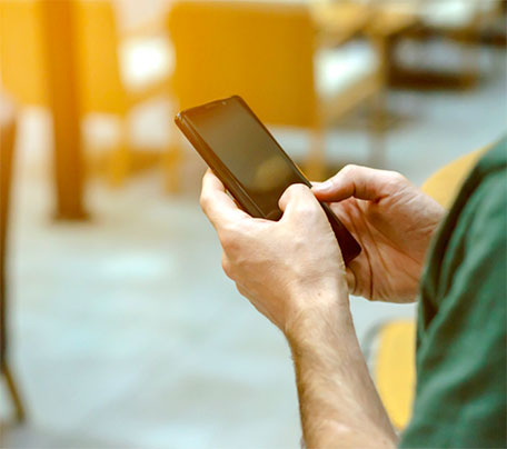 man using app with phone